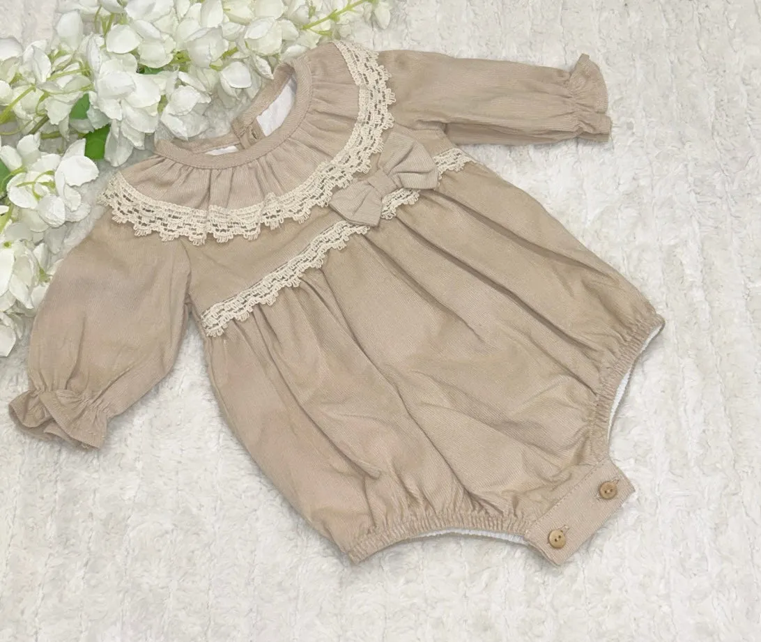 Beige long sleeved romper