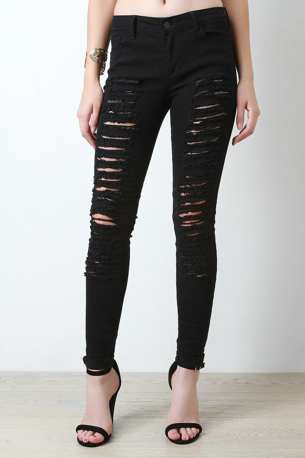 Distressed Mid Rise Skinny Jeans