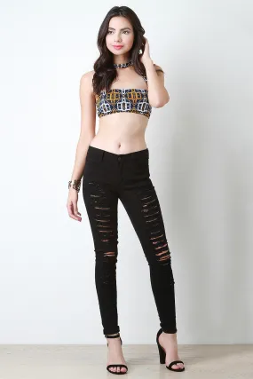 Distressed Mid Rise Skinny Jeans